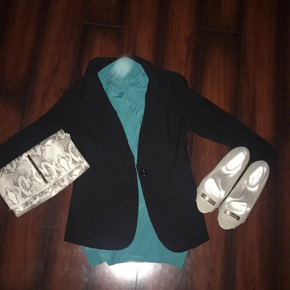 Green sleeveless blouse